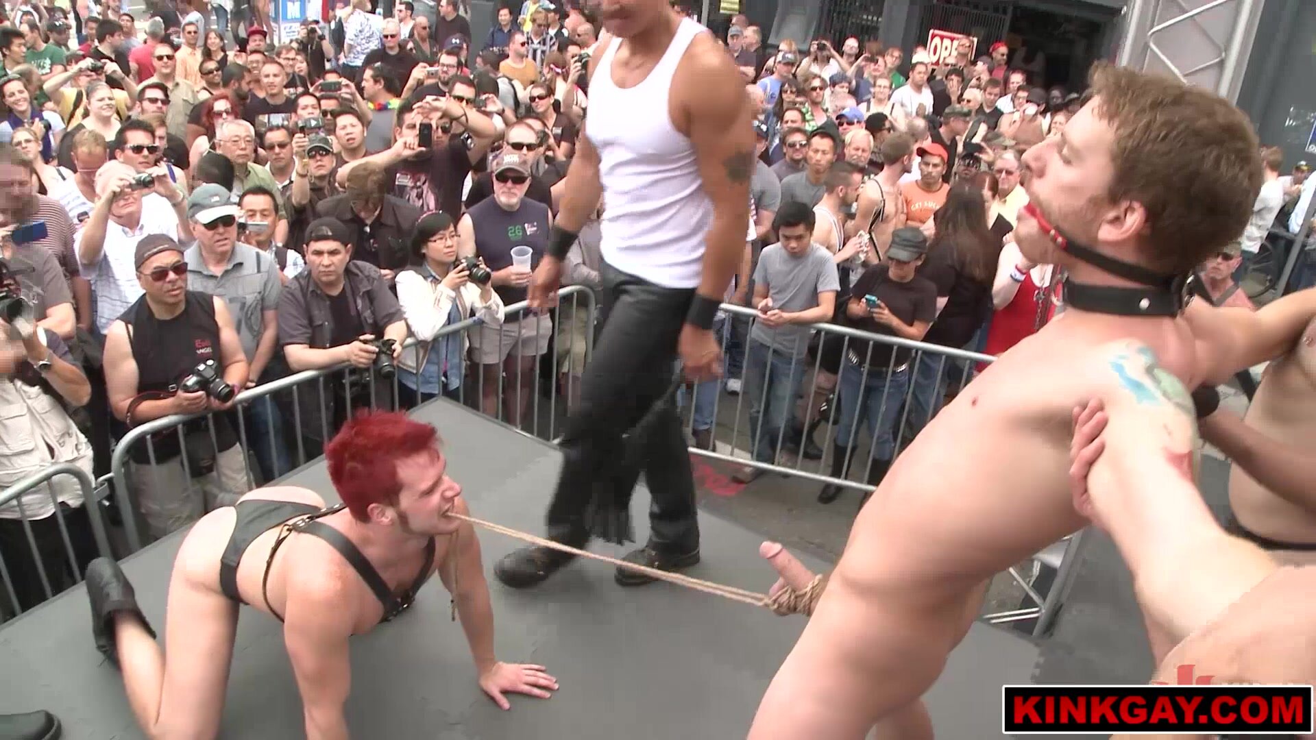 Dude gets his balls crushed in public during a crazy BDSM show!